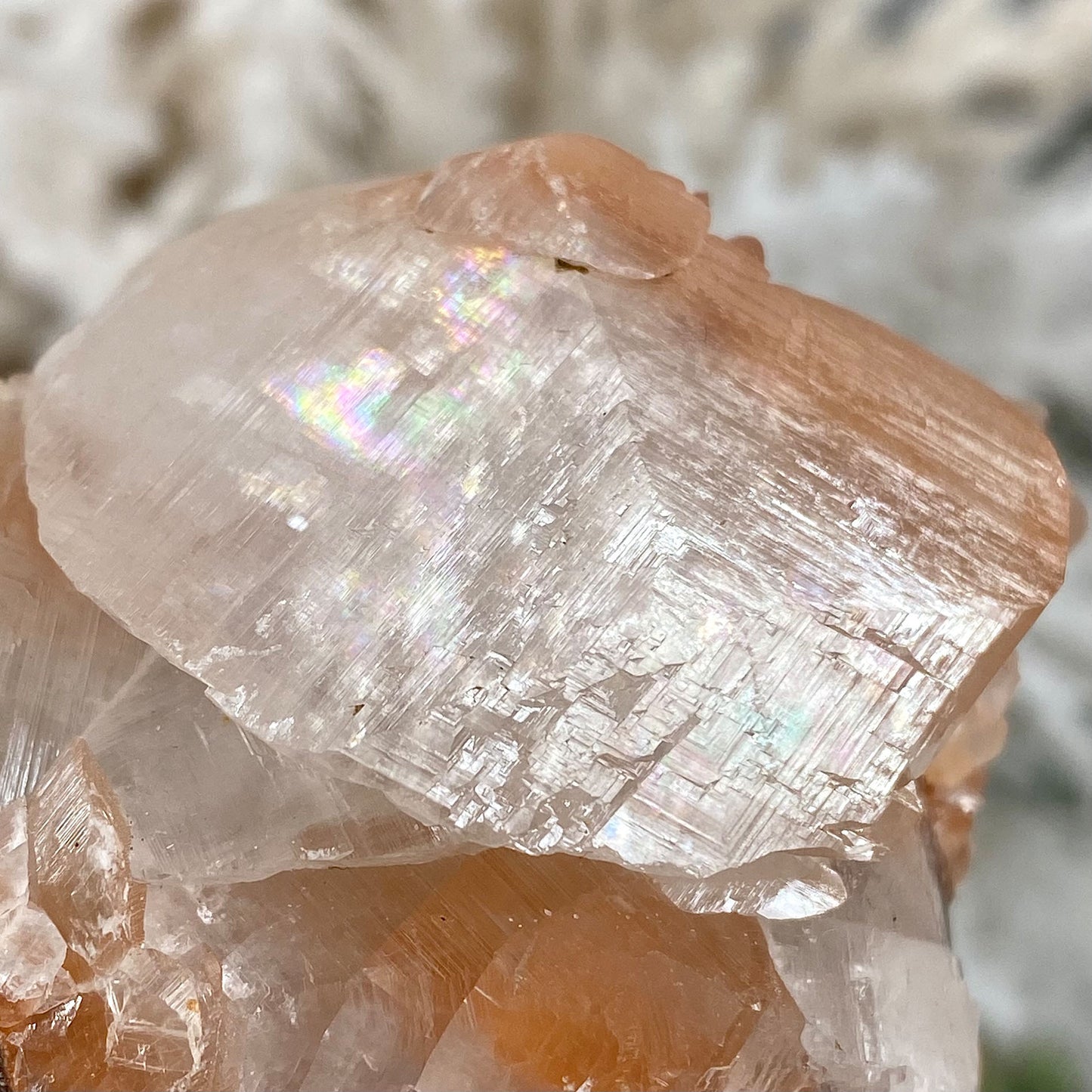 Peachy Red & Clear Calcite Cluster with Rainbow Flash