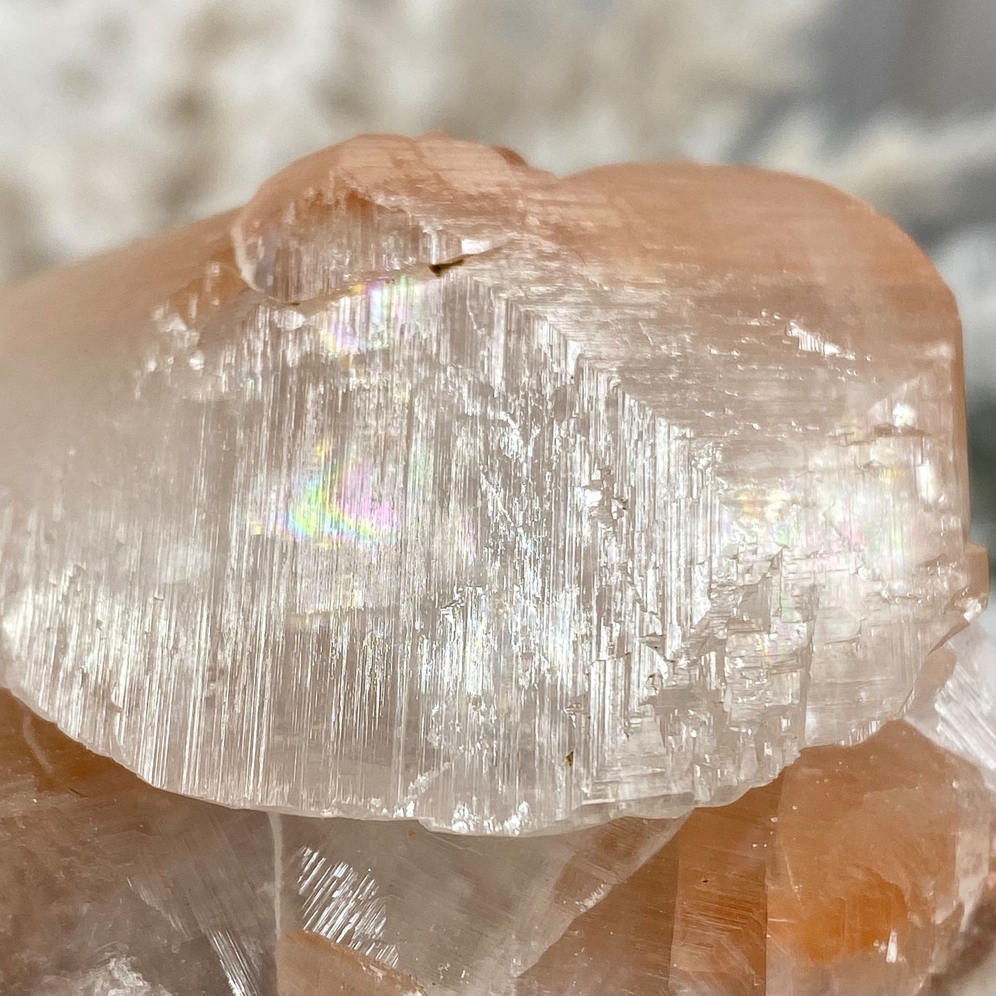 Peachy Red & Clear Calcite Cluster with Rainbow Flash