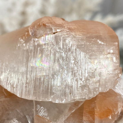 Peachy Red & Clear Calcite Cluster with Rainbow Flash